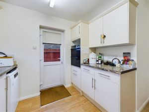 Kitchen showing back door- click for photo gallery